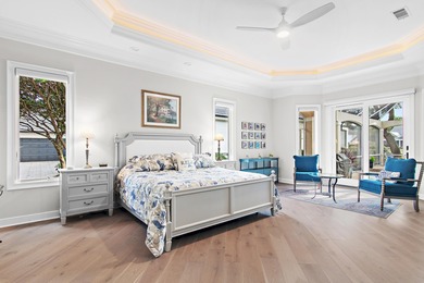 Experience refined coastal living at 463 Captains Circle, a on Regatta Bay Golf and Country Club in Florida - for sale on GolfHomes.com, golf home, golf lot