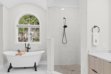 Experience refined coastal living at 463 Captains Circle, a on Regatta Bay Golf and Country Club in Florida - for sale on GolfHomes.com, golf home, golf lot