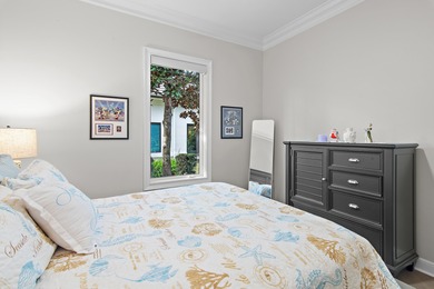 Experience refined coastal living at 463 Captains Circle, a on Regatta Bay Golf and Country Club in Florida - for sale on GolfHomes.com, golf home, golf lot