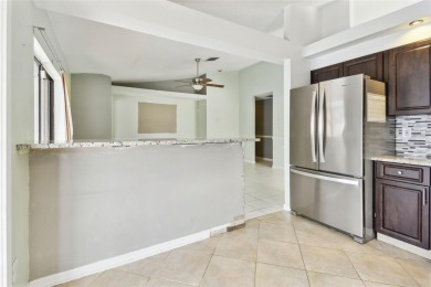 This home is priced to sell and well under the recent comps! on Summerfield Crossing Golf Club in Florida - for sale on GolfHomes.com, golf home, golf lot