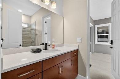 Experience the best of modern Florida living in this custom on Palm Harbor Golf Club in Florida - for sale on GolfHomes.com, golf home, golf lot