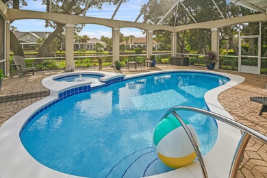 Experience refined coastal living at 463 Captains Circle, a on Regatta Bay Golf and Country Club in Florida - for sale on GolfHomes.com, golf home, golf lot