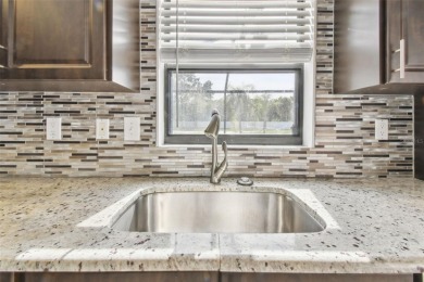 This home is priced to sell and well under the recent comps! on Summerfield Crossing Golf Club in Florida - for sale on GolfHomes.com, golf home, golf lot