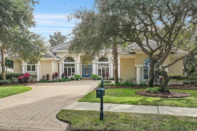 Experience refined coastal living at 463 Captains Circle, a on Regatta Bay Golf and Country Club in Florida - for sale on GolfHomes.com, golf home, golf lot
