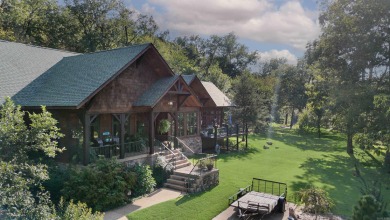 Nestled on 23 acres in the heart of Cherokee Village, Star Falls on Cherokee Village North Course in Arkansas - for sale on GolfHomes.com, golf home, golf lot