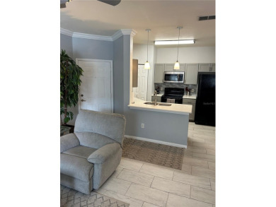 Move in ready ground floor corner unit in highly desirable on Innisbrook Resort and Golf Club in Florida - for sale on GolfHomes.com, golf home, golf lot