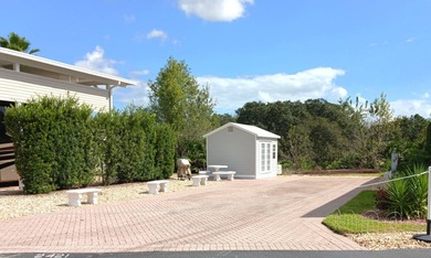 This nicely landscaped vacant property is located in the 55+ on Deer Creek RV Golf Resort in Florida - for sale on GolfHomes.com, golf home, golf lot