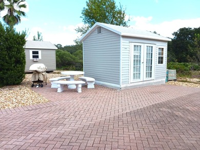 This nicely landscaped vacant property is located in the 55+ on Deer Creek RV Golf Resort in Florida - for sale on GolfHomes.com, golf home, golf lot