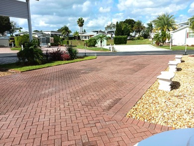 This nicely landscaped vacant property is located in the 55+ on Deer Creek RV Golf Resort in Florida - for sale on GolfHomes.com, golf home, golf lot