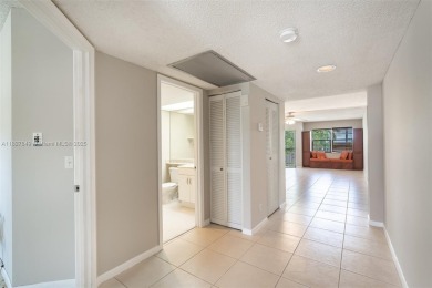Welcome to resort stye living in Century Village! This 1 Bed/ 1 on Flamingo Lakes Country Club in Florida - for sale on GolfHomes.com, golf home, golf lot