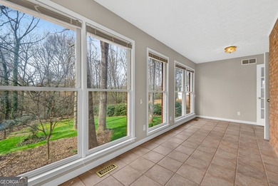 Welcome to this expansive four-sided brick ranch home situated on Lake Spivey Golf Club in Georgia - for sale on GolfHomes.com, golf home, golf lot