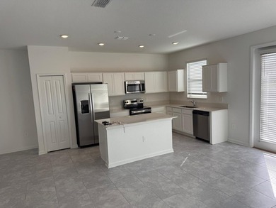 Beautiful 3-bedroom, 2.5-bath townhome located in the highly on National Golf Course in Florida - for sale on GolfHomes.com, golf home, golf lot