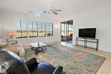 Welcome home to this beautiful golf course retreat. Perfectly on Grand Harbor Golf and Country Club in Florida - for sale on GolfHomes.com, golf home, golf lot