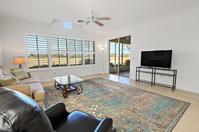 Welcome home to this beautiful golf course retreat. Perfectly on Grand Harbor Golf and Country Club in Florida - for sale on GolfHomes.com, golf home, golf lot