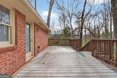 Welcome to this expansive four-sided brick ranch home situated on Lake Spivey Golf Club in Georgia - for sale on GolfHomes.com, golf home, golf lot