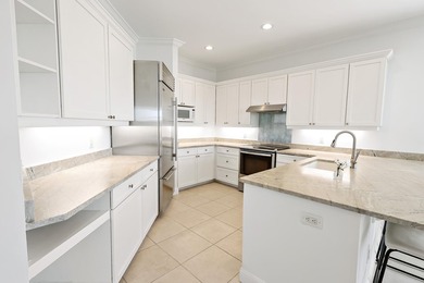 Welcome home to this beautiful golf course retreat. Perfectly on Grand Harbor Golf and Country Club in Florida - for sale on GolfHomes.com, golf home, golf lot