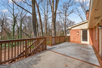 Welcome to this expansive four-sided brick ranch home situated on Lake Spivey Golf Club in Georgia - for sale on GolfHomes.com, golf home, golf lot