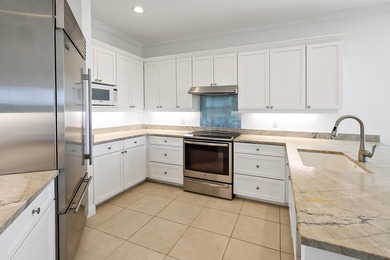 Welcome home to this beautiful golf course retreat. Perfectly on Grand Harbor Golf and Country Club in Florida - for sale on GolfHomes.com, golf home, golf lot