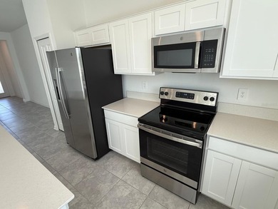 Beautiful 3-bedroom, 2.5-bath townhome located in the highly on National Golf Course in Florida - for sale on GolfHomes.com, golf home, golf lot