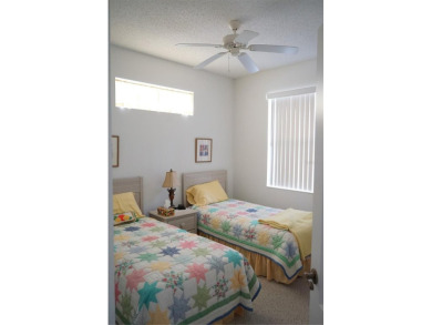 Original snow bird owners in this 2001 attached condo located in on Scepter Golf Club in Florida - for sale on GolfHomes.com, golf home, golf lot