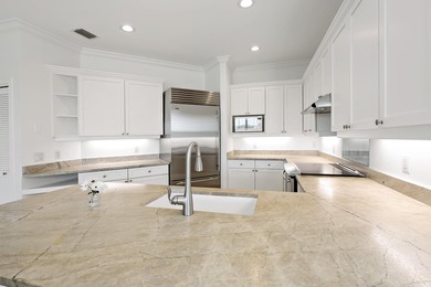 Welcome home to this beautiful golf course retreat. Perfectly on Grand Harbor Golf and Country Club in Florida - for sale on GolfHomes.com, golf home, golf lot