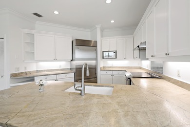 Welcome home to this beautiful golf course retreat. Perfectly on Grand Harbor Golf and Country Club in Florida - for sale on GolfHomes.com, golf home, golf lot