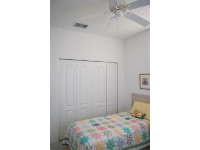 Original snow bird owners in this 2001 attached condo located in on Scepter Golf Club in Florida - for sale on GolfHomes.com, golf home, golf lot