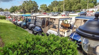 Original snow bird owners in this 2001 attached condo located in on Scepter Golf Club in Florida - for sale on GolfHomes.com, golf home, golf lot