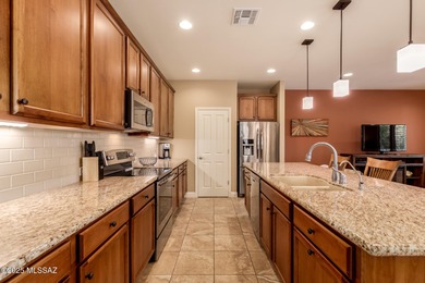 Effortless living in this beautifully maintained Villa. Perfect on Quail Creek Country Club  in Arizona - for sale on GolfHomes.com, golf home, golf lot