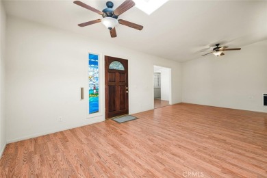 Mutual 12-68E ~ This beautifully expanded 2 bedroom 1 bath home on Leisure World Seal Beach Golf Course in California - for sale on GolfHomes.com, golf home, golf lot