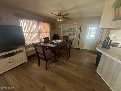 Enjoy a home and your own golf cart in the active 55+ community on Sabal Trace Golf and Country Club in Florida - for sale on GolfHomes.com, golf home, golf lot