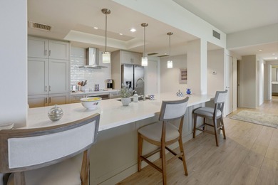 You will enjoy a very open floor plan with newer wide plank tile on Desert Island Golf and Country Club in California - for sale on GolfHomes.com, golf home, golf lot