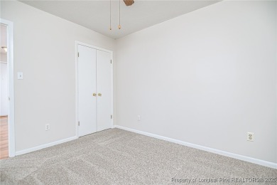 Welcome to this charming 3-bedroom, 2-bath ranch-style home on Hope Mills Golf and Country Club in North Carolina - for sale on GolfHomes.com, golf home, golf lot
