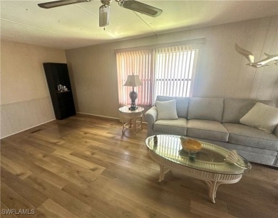 Enjoy a home and your own golf cart in the active 55+ community on Sabal Trace Golf and Country Club in Florida - for sale on GolfHomes.com, golf home, golf lot