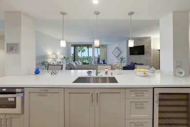 You will enjoy a very open floor plan with newer wide plank tile on Desert Island Golf and Country Club in California - for sale on GolfHomes.com, golf home, golf lot