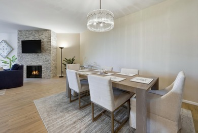 You will enjoy a very open floor plan with newer wide plank tile on Desert Island Golf and Country Club in California - for sale on GolfHomes.com, golf home, golf lot