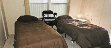 Enjoy a home and your own golf cart in the active 55+ community on Sabal Trace Golf and Country Club in Florida - for sale on GolfHomes.com, golf home, golf lot