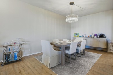 You will enjoy a very open floor plan with newer wide plank tile on Desert Island Golf and Country Club in California - for sale on GolfHomes.com, golf home, golf lot