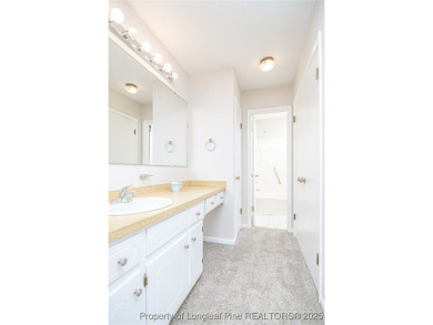 Welcome to this charming 3-bedroom, 2-bath ranch-style home on Hope Mills Golf and Country Club in North Carolina - for sale on GolfHomes.com, golf home, golf lot
