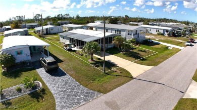 Enjoy a home and your own golf cart in the active 55+ community on Sabal Trace Golf and Country Club in Florida - for sale on GolfHomes.com, golf home, golf lot