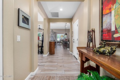 Beautiful, very well-maintained contemporary courtyard villa on Tuscany Falls At Pebble Creek in Arizona - for sale on GolfHomes.com, golf home, golf lot