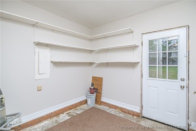 Welcome to this charming 3-bedroom, 2-bath ranch-style home on Hope Mills Golf and Country Club in North Carolina - for sale on GolfHomes.com, golf home, golf lot
