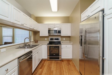 Welcome to Spinnaker Townhomes - Unit 6006, a rare single-level on Hoakalei Country Club At Ocean Pointe in Hawaii - for sale on GolfHomes.com, golf home, golf lot