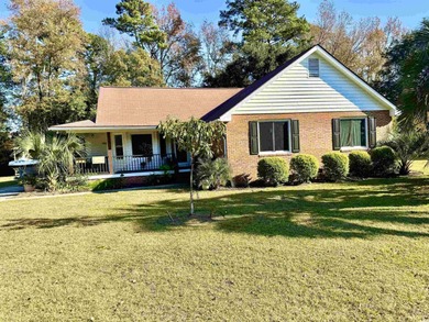 Looking for a gorgeous family home in a highly desirable on Wedgefield Plantation Golf Club in South Carolina - for sale on GolfHomes.com, golf home, golf lot