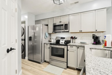 This beautiful beach condo located at River Oaks Golf Plantation on  in South Carolina - for sale on GolfHomes.com, golf home, golf lot