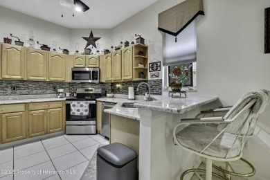 Such a beautiful home to enjoy from the gorgeous front door, and on Glen Lakes Country Club in Florida - for sale on GolfHomes.com, golf home, golf lot