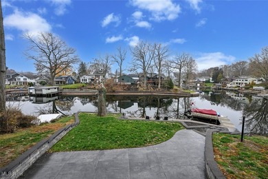 Experience the pinnacle of modern lakefront luxury. This on Turkeyfoot Lake Golf Links in Ohio - for sale on GolfHomes.com, golf home, golf lot