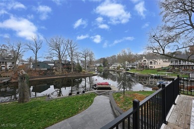 Experience the pinnacle of modern lakefront luxury. This on Turkeyfoot Lake Golf Links in Ohio - for sale on GolfHomes.com, golf home, golf lot