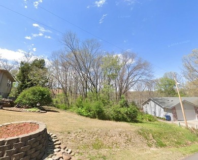 Buildable 0.31-acre parcel nestled on Sable Drive in one of on Bella Vista Country Club - Scottsdale in Arkansas - for sale on GolfHomes.com, golf home, golf lot