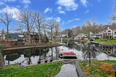 Experience the pinnacle of modern lakefront luxury. This on Turkeyfoot Lake Golf Links in Ohio - for sale on GolfHomes.com, golf home, golf lot